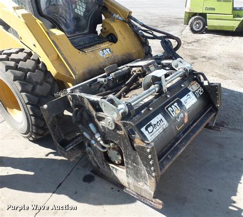 caterpillar skid steer with attachments on a trailer|cat skid steer milling attachment.